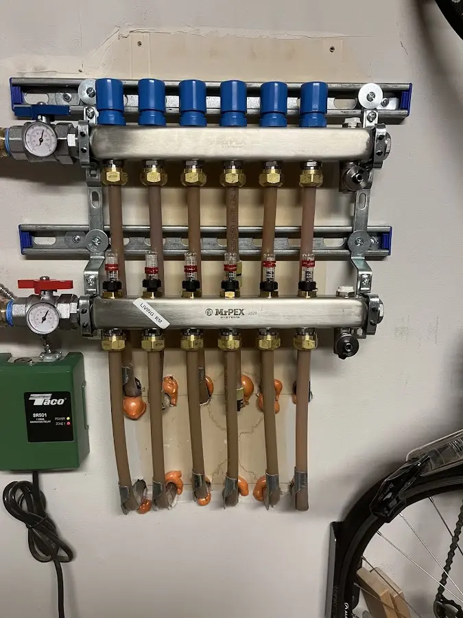 Plumber performing Water Heater Repair at a residential property in Harlingen